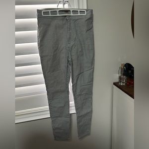 Blue and white striped skinny leg pants.